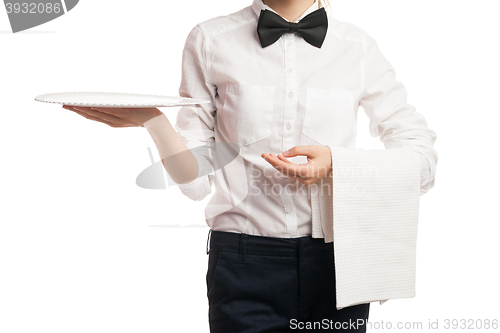 Image of Close-up of elegant waitress holding tray and towel