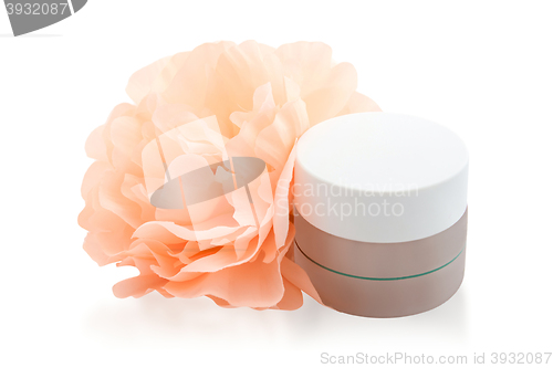 Image of Spa cosmetic cream and flower isolated on white