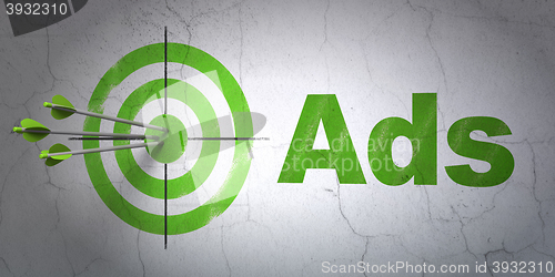 Image of Advertising concept: target and Ads on wall background