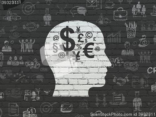 Image of Business concept: Head With Finance Symbol on wall background