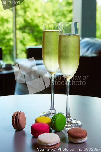 Image of Two glasses of sparkling wine or champagne on a table