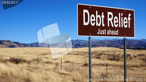 Image of Debt Relief brown road sign