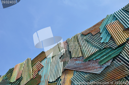 Image of Zinc fence on blue sky background