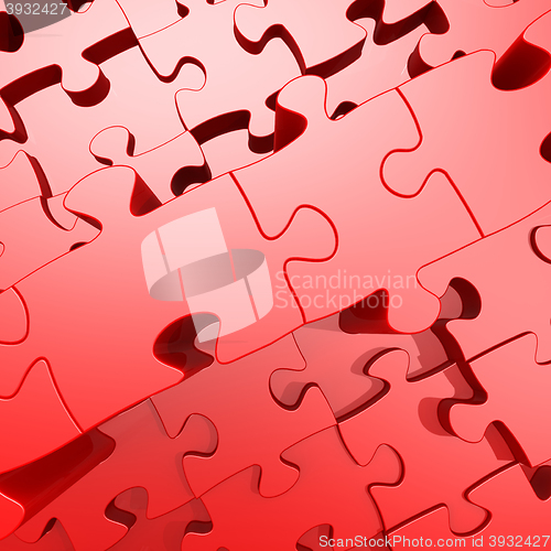 Image of Red jigsaw puzzle with 3D effect  