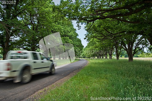 Image of car on country road