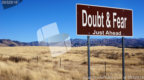 Image of Doubt and Fear brown road sign brown road sign