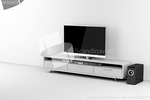 Image of Tv and soundbar with subwoofer