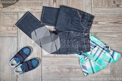 Image of Flat lay picture of boy\'s casual outfit.