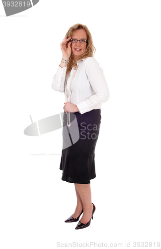 Image of Business woman standing smiling..