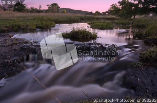 Image of sunrise stream of water