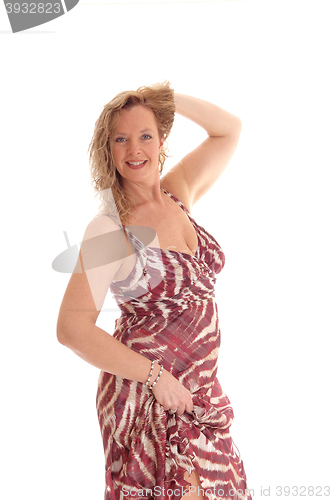 Image of Blond woman in summer dress.