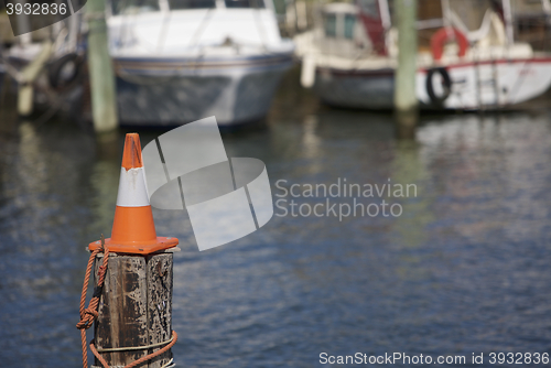 Image of Cone on a pole, warning