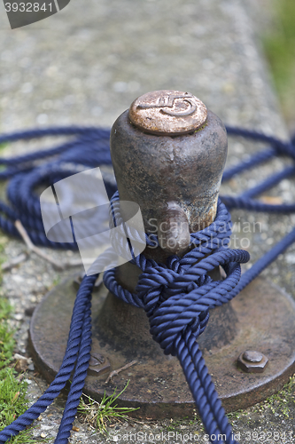 Image of Boat anchored pole