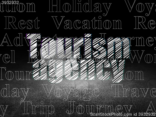 Image of Vacation concept: Tourism Agency in grunge dark room
