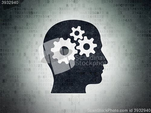 Image of Finance concept: Head With Gears on Digital Data Paper background