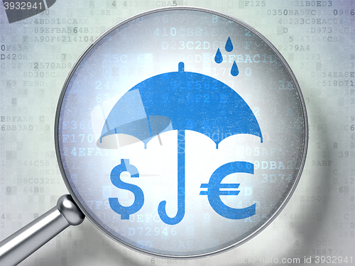 Image of Protection concept: Money And Umbrella with optical glass on digital background