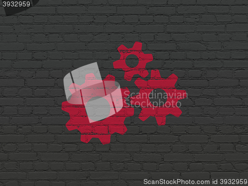 Image of Business concept: Gears on wall background