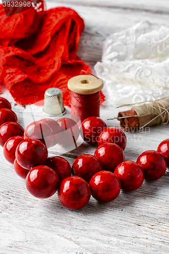 Image of Fabric and large coral beads