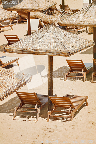 Image of Umbrellas and Sun Loungers