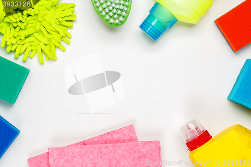 Image of House cleaning products on white table