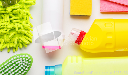 Image of House cleaning products on white table