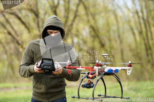 Image of Man flying with the drone