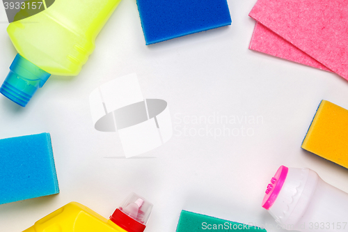 Image of House cleaning products on white table