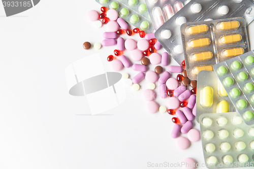 Image of Colorful tablets on white background