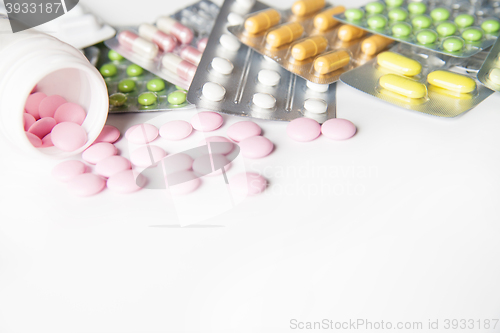 Image of Close-up of many pills on table