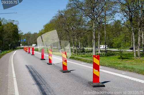 Image of Row of colorful roadblocks