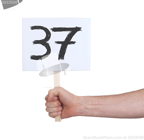 Image of Sign with a number, 37