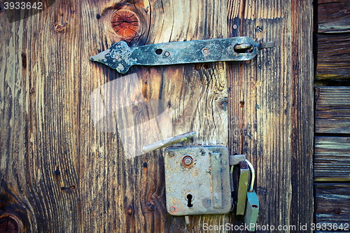 Image of ancient locks on wooden door