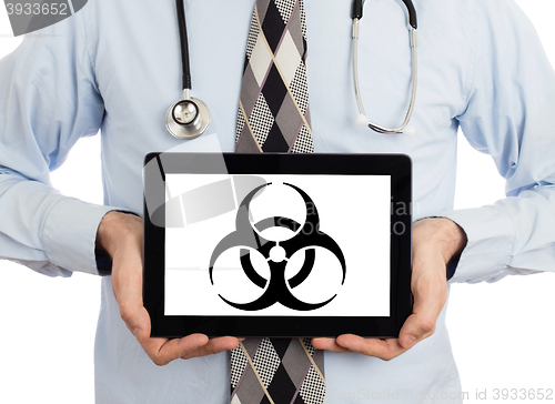 Image of Doctor holding tablet - Warning! Biohazard!