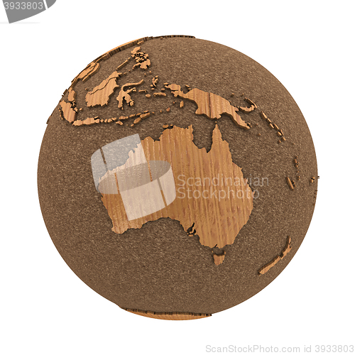 Image of Australia on wooden planet Earth