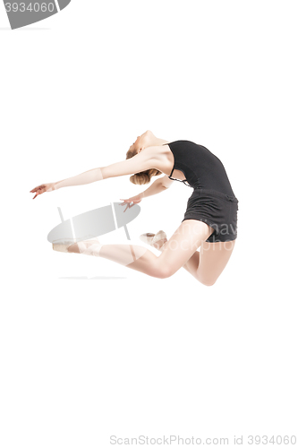 Image of ballet dancer jumping in bend