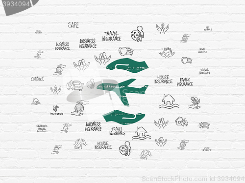 Image of Insurance concept: Airplane And Palm on wall background