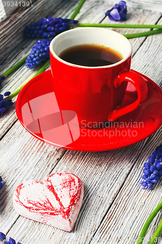 Image of Morning coffee and flowers