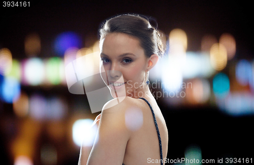 Image of beautiful young asian woman with earring