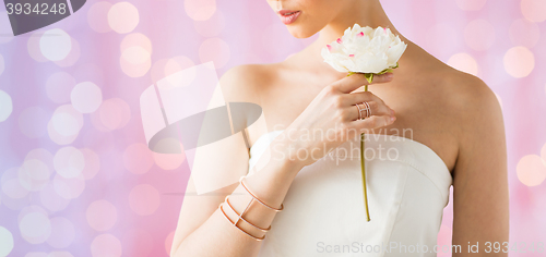 Image of close up of beautiful woman with ring and bracelet