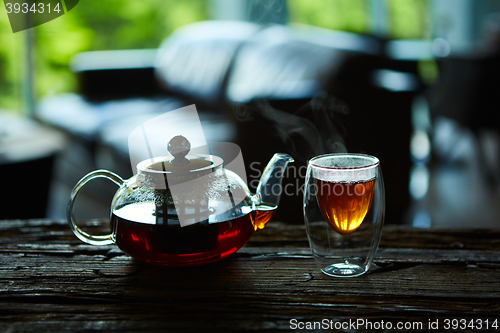 Image of Cup Of Tea And Teapot