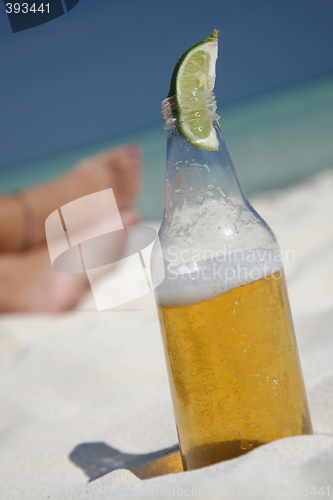 Image of Beer and Feet on the Beach