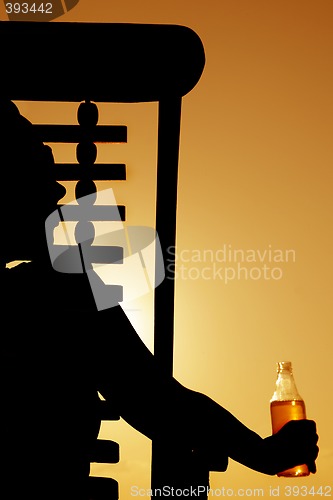 Image of Beer and Deckchair sunset silhouette