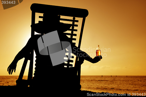 Image of Beer and Deckchair sunset silhouette