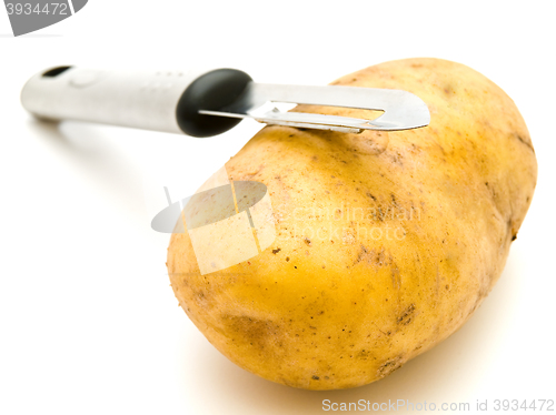 Image of Potato with Knife
