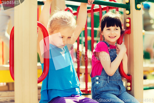 Image of group of happy little girls on children playground