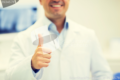 Image of close up of doctor showing thumbs up at hospital