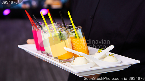 Image of Set of different vegetable juices on the bar.