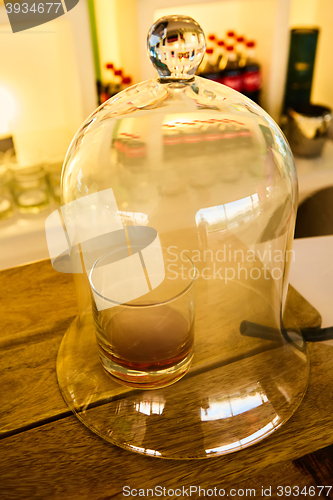 Image of Guatemalan rum under a glass dome
