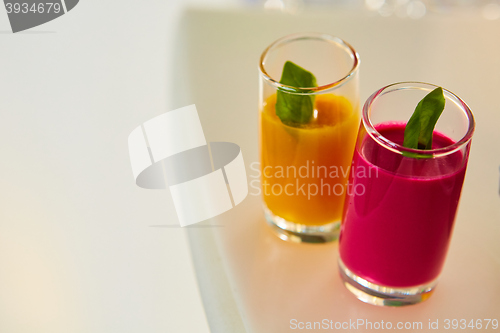 Image of Set of different vegetable juices on the bar.