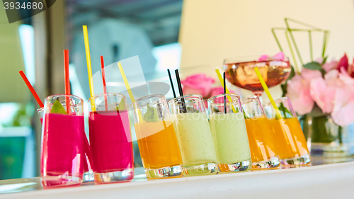 Image of Set of different vegetable juices on the bar.